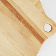 Wooden pizza board close up